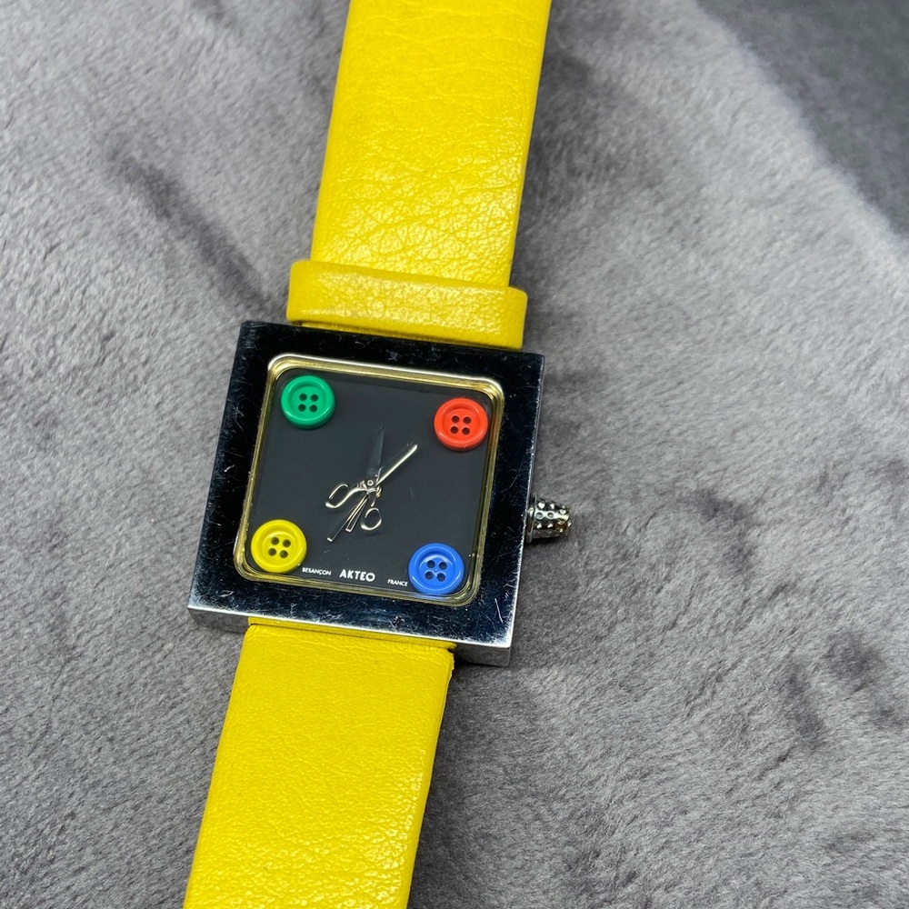 Yellow watch with Multicolor Buttons